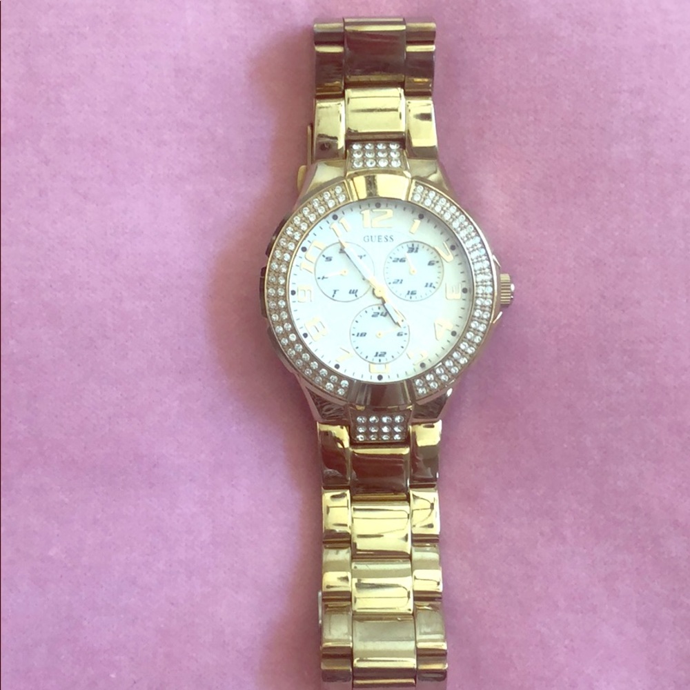 Guess Brand gold blinged out watch.  Perfect! Date